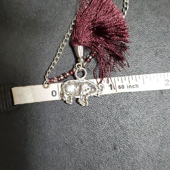 Silver tone elephant and tassel necklace - Picture 4 of 10